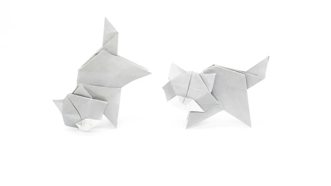 two playful origami cats