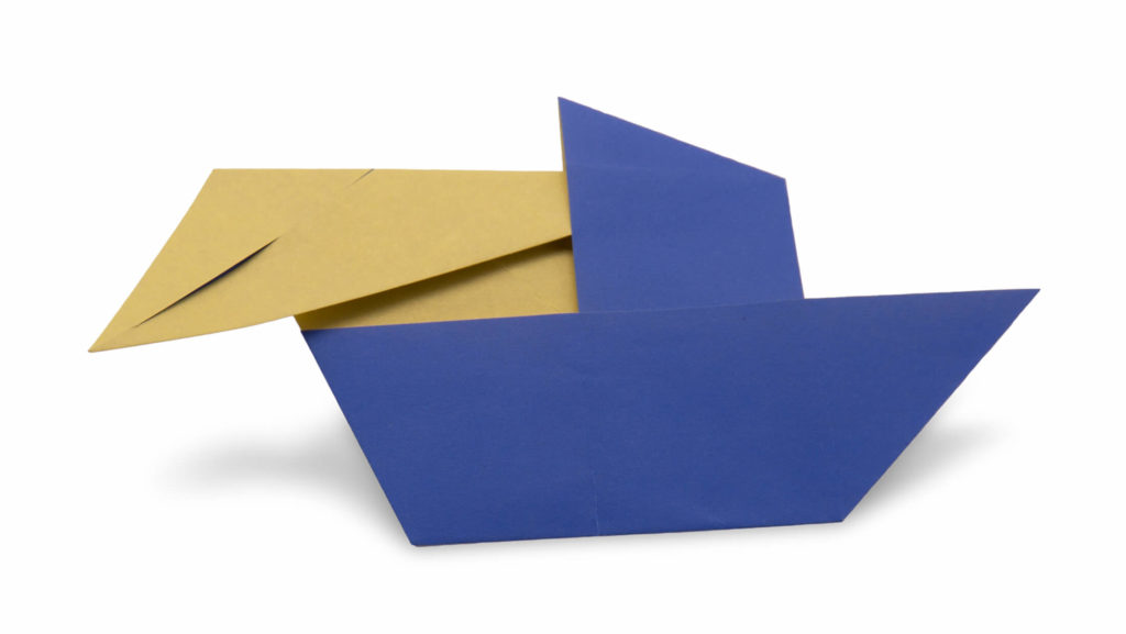 an origami man in a boat in progress 