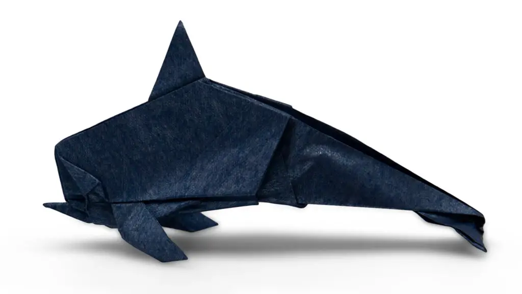 origami dolphin 2 designed by red paper from the book pure origami