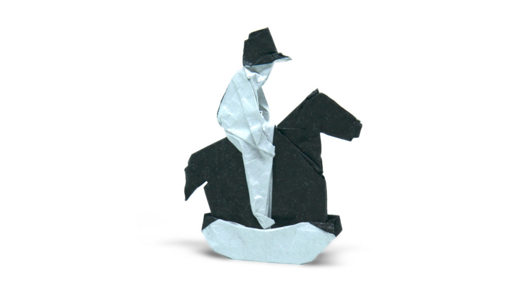 origami boy on a rocking horse by neal elias