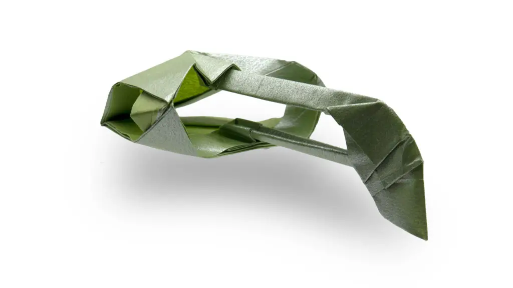 origami romulan warbird (futuristic origami spaceship from star trek folded from green paper)