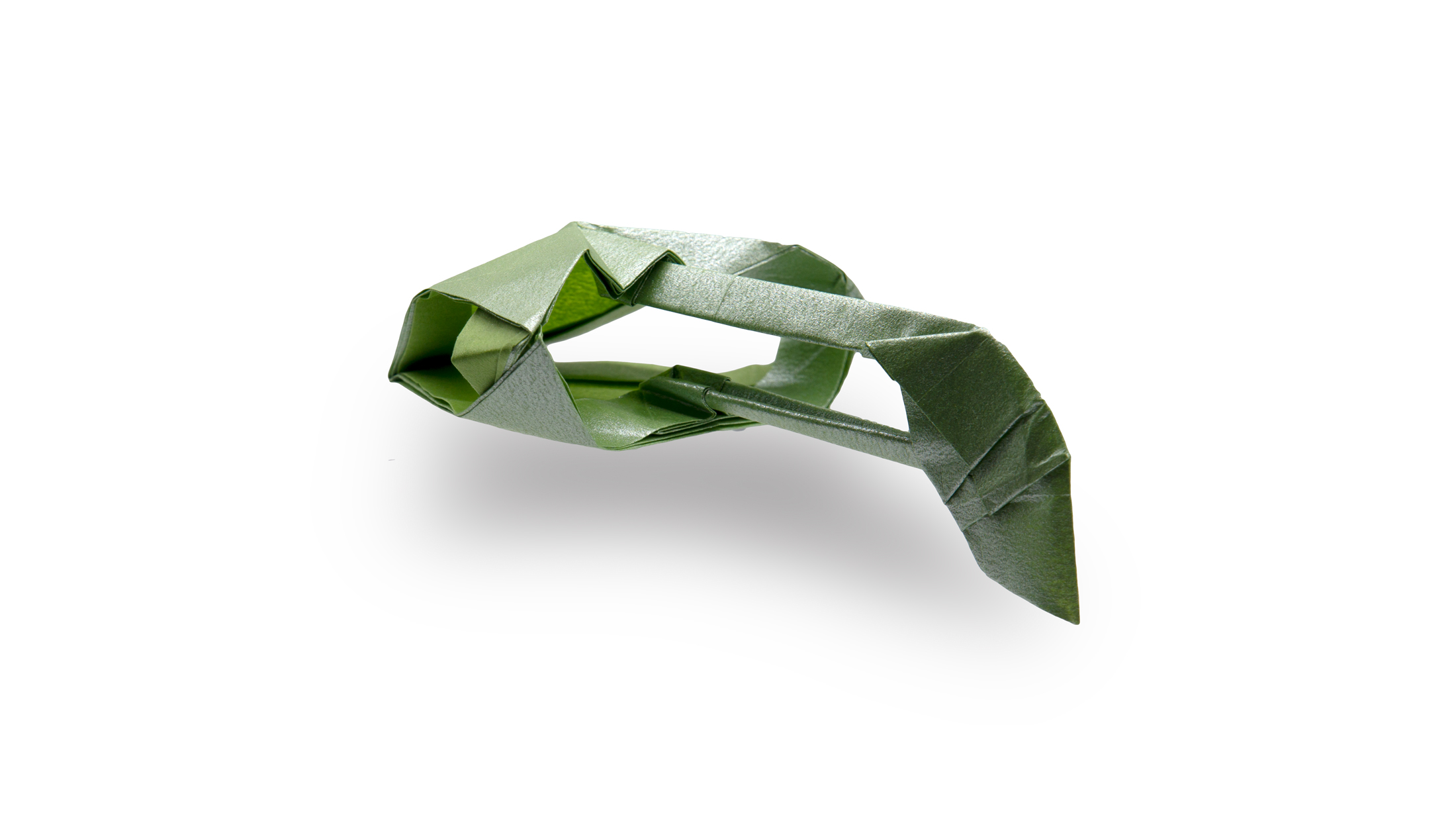 origami romulan warbird (futuristic origami spaceship from star trek folded from green paper)