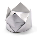 traditional origami crown folded with metalic silver paper