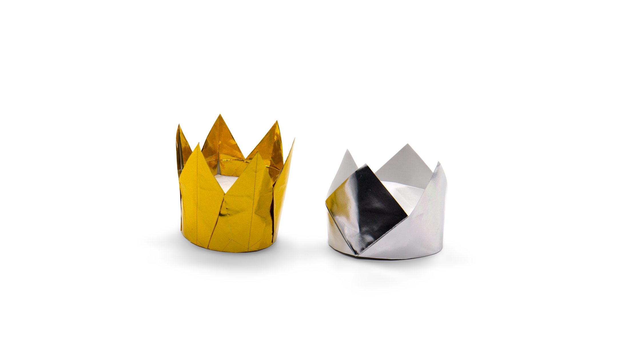 the six pointed crown in gold next to the traditional origami crown in silver